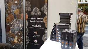 Lebanon coin sets in their distinguished packing on display